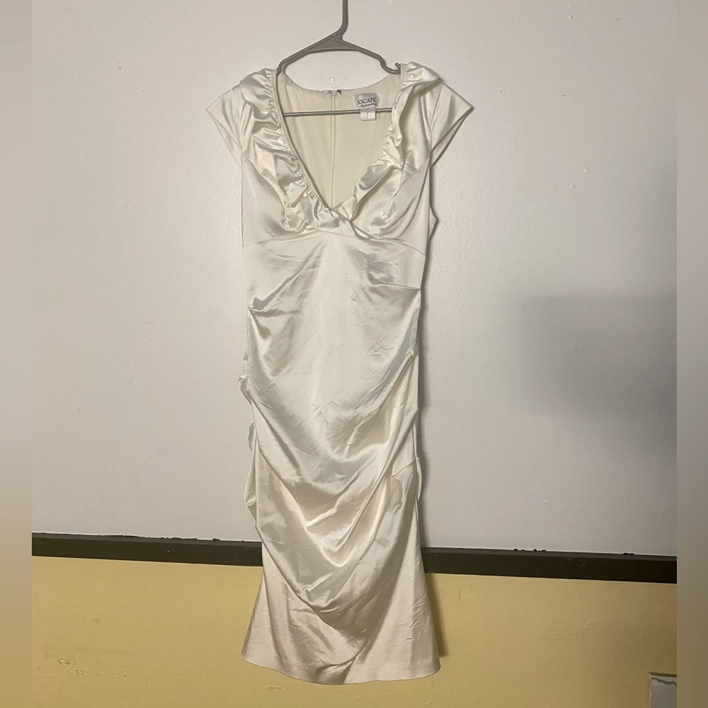 Beautiful fancy dress, fits petite/small.  Worn once and got many compliments.